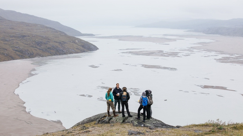 JSEP Students in Greenland, gathered for a talk in front of the Greenland landscape