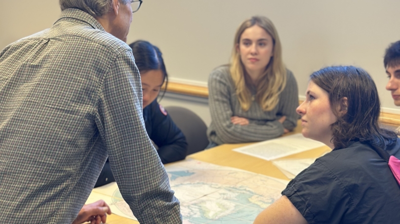 Students engaging over Arctic artifacts