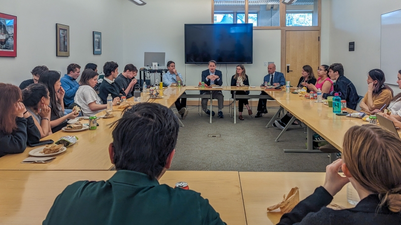 Josh Paul and Elizabeth Shackelford with War and Peace Fellows