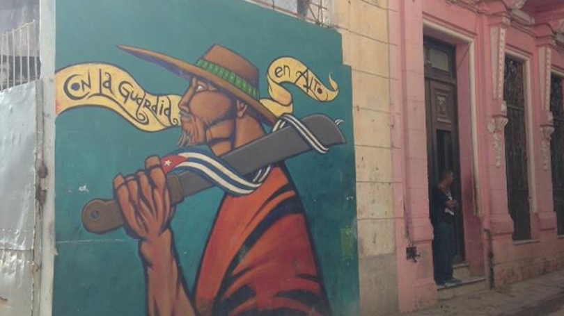 Street art in Centro Habana celebrating the labor of the Committees for the Defense of the Revolution.