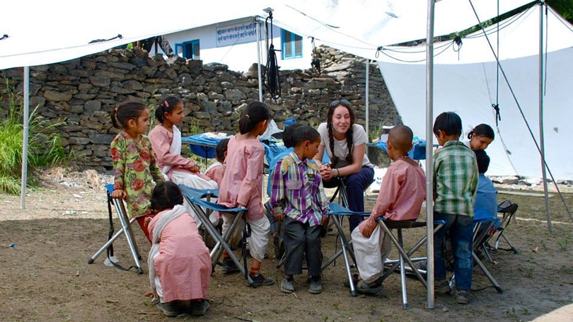 Sydney Kamen leading a handwashing workshop with a group of children