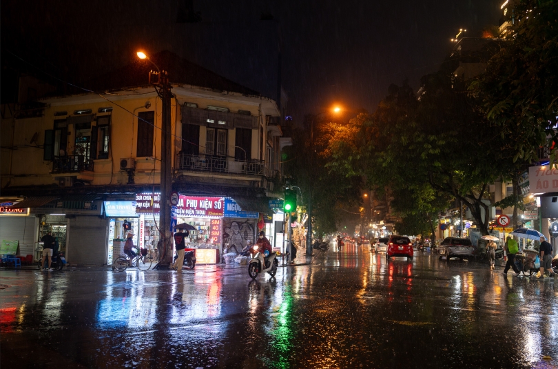 A street corner in Hanoi during a downpour
